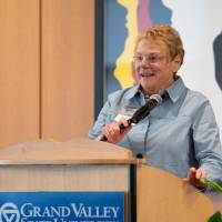 Lynn "Chick" Blue speaking at the podium.